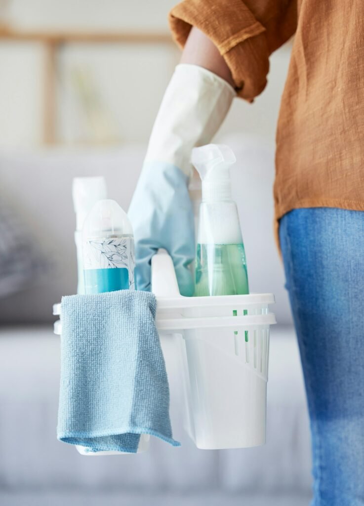 Hands, cleaning detergent and spray bottle, container and cleaning service for bacteria, glove and